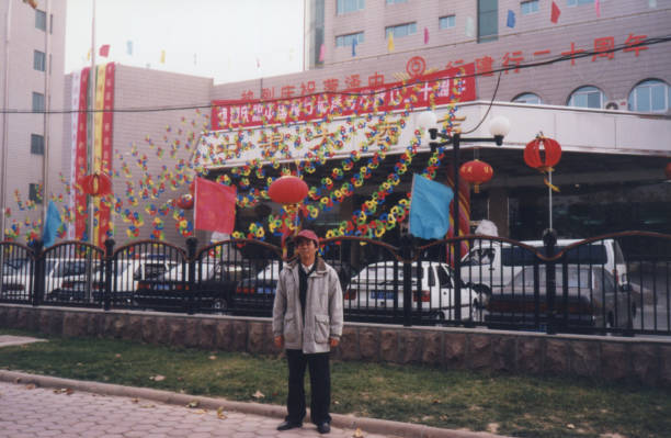 istock 1990s Chinese Men Real Life old photo 1360800624
