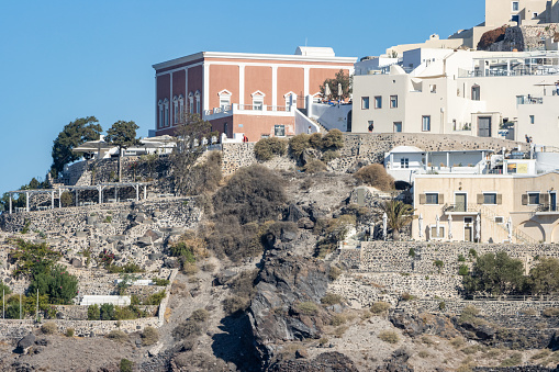 Buildings and restaurants and people visible in Firá on Santorini Caldera in South Aegean Islands, Greece