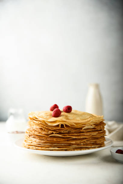 Crepes Traditional homemade crepes on a white plate blini photos stock pictures, royalty-free photos & images