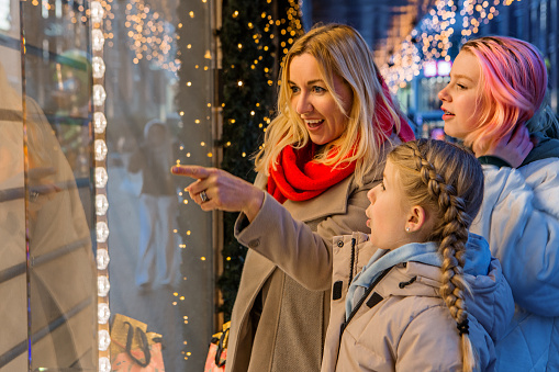 A beautiful blonde dutch mother and daughters at Winter Xmas Shopping in the Hague, Holland