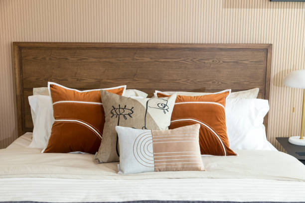 istock Red brown tone pillow setting in bedroom. 1360807176