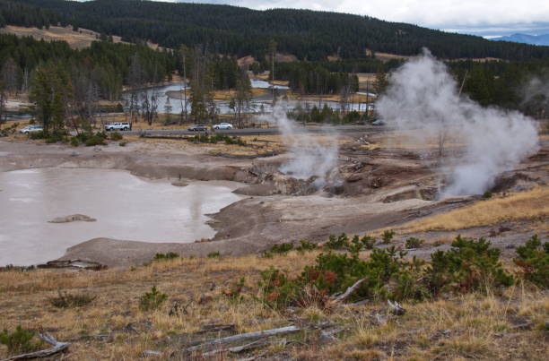 Mud Volcano Area in Yellowstone National Park in Wyoming in the USA Mud Volcano Area in Yellowstone National Park in Wyoming in the USA mud volcano stock pictures, royalty-free photos & images