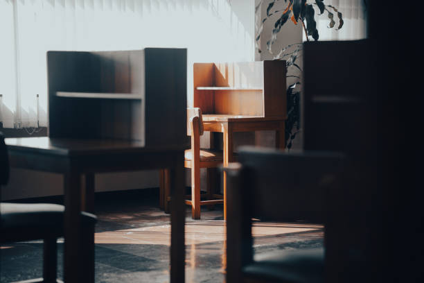 istock wooden table chair for reading in library 1360813478
