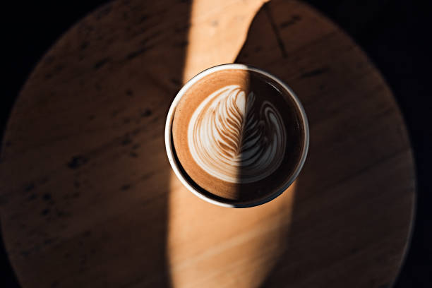 istock Selective focus cup of hot latte art coffee 1360814434