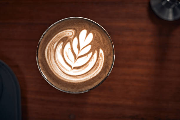 istock Selective focus cup of hot latte art coffee 1360814448