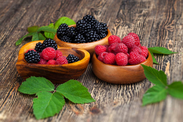 istock harvested red raspberries, close up 1360815723