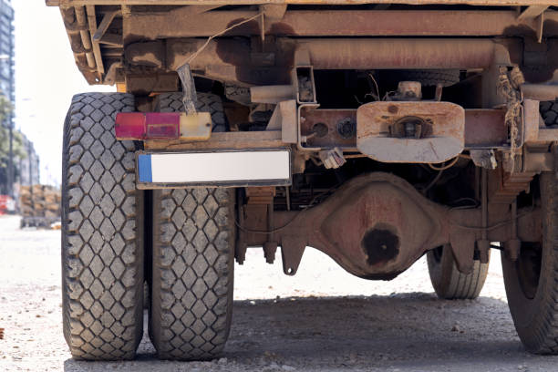 istock Heavy construction truck outdoors for public place reconstruction. 1360818625