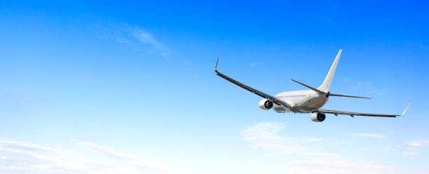 istock airplane flying away in to sky 1360822498
