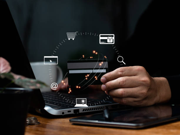 istock Using wallet app technology, you may make an online payment. The man uses an online program to pay and shop. The notion of digital money transmission, banking, and e-commerce. 1360824417