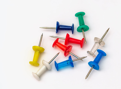 Thumbtacks isolated on white background. Close-up.