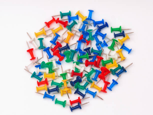 istock Thumbtacks isolated on white background. Close-up. 1360827567