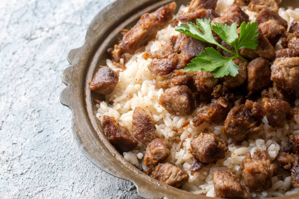 istock Turkish Meat Et Kavurma with rice - pilav (Turkish name; kurban kavurma, pilav ustu kavurma) 1360830263
