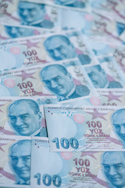 istock Background with hundred Turkish Lira banknotes that Turkey currency 1360831215