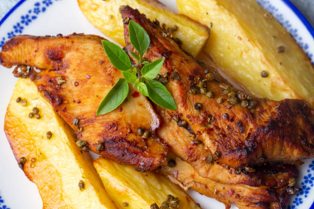 istock Turkish food; Baked chicken and potatoes (Turkish name; firinda tavuk patates) 1360832972