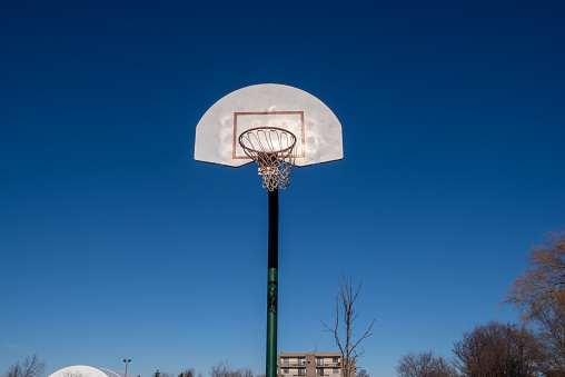 Basket ball hoop in an urban park, Williamsville, NY.