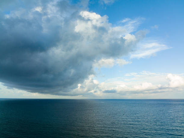 istock Calm storm slouds in the sky over ocean 1360841894