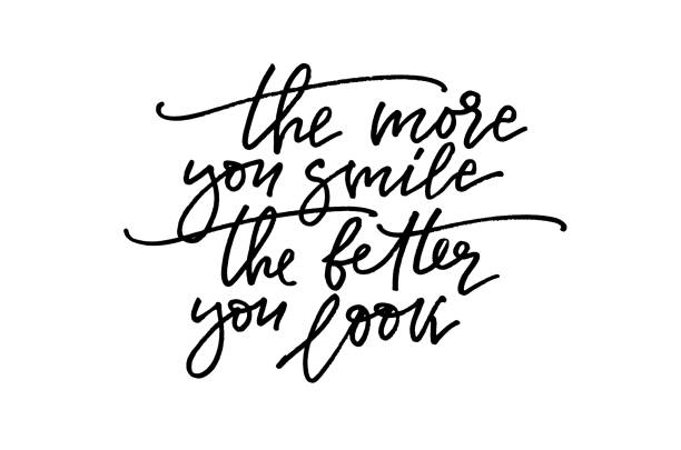 istock The more you smile the better you look - handwritten text. Modern calligraphy. Inspirational quote. Isolated on white 1360843423