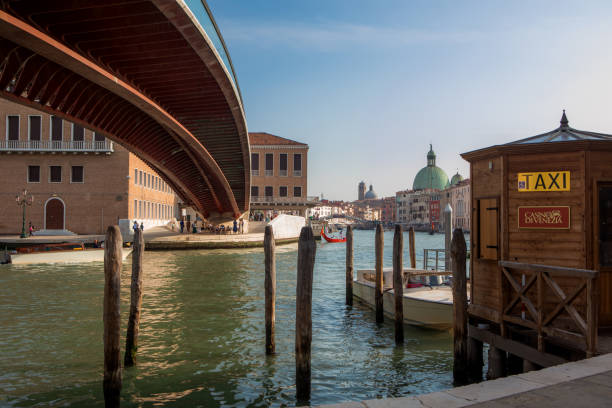 Venice, Italy - September 09th, 2021: A view of the canals and gondolas as the city start to reopen in the centre of Venice during the easing of the corona virus lockdown in the Autumn of 2021 in the centre of Venice, Italy