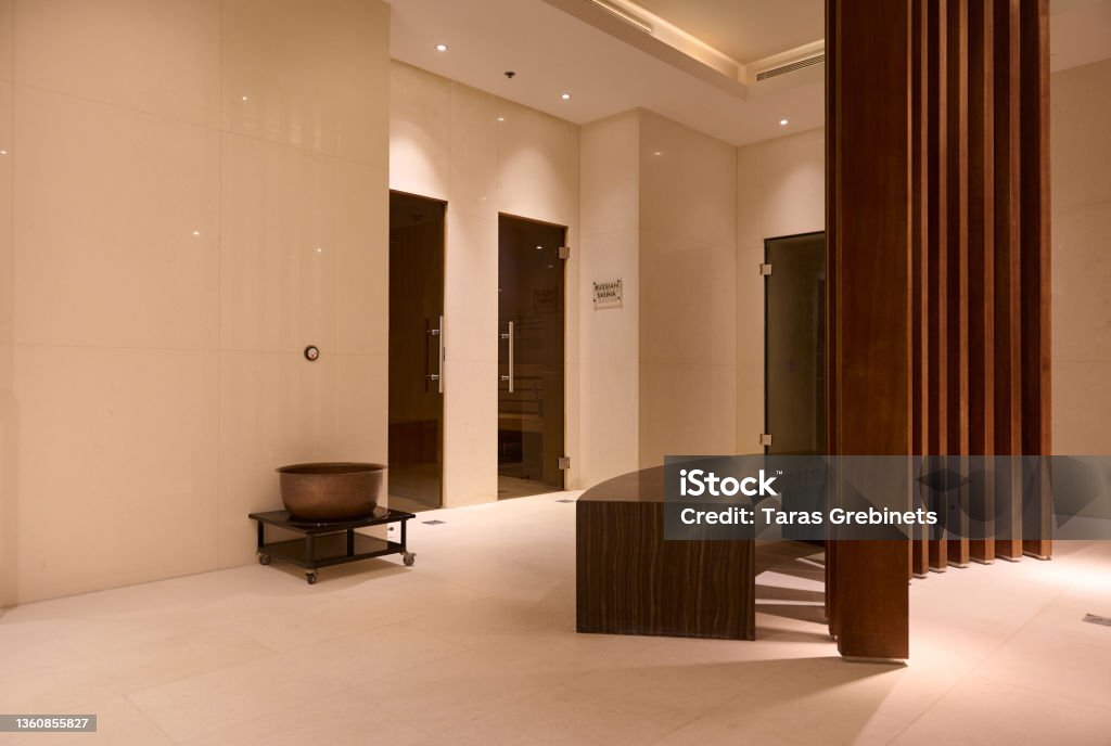 Wooden desk in the reception of a wellness spa resort with private rooms of Turkish bath and Russian sauna View of a wooden desk in the reception of a wellness spa resort with private rooms odf Turkish bath and Russian sauna Health Spa Stock Photo