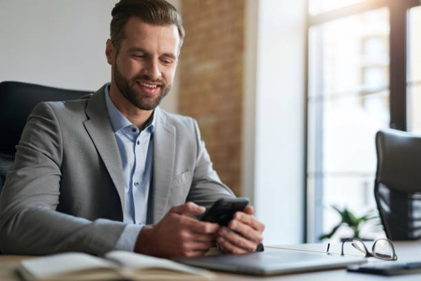 istock Business company employee smiling at his workplace 1360856049
