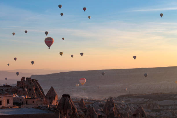istock Magnificent Morning with Hot Air Balloons 1360858677