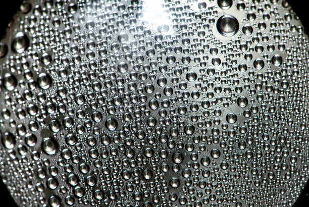Misted wet glass water drops of dew on the glass abstraction stock photo