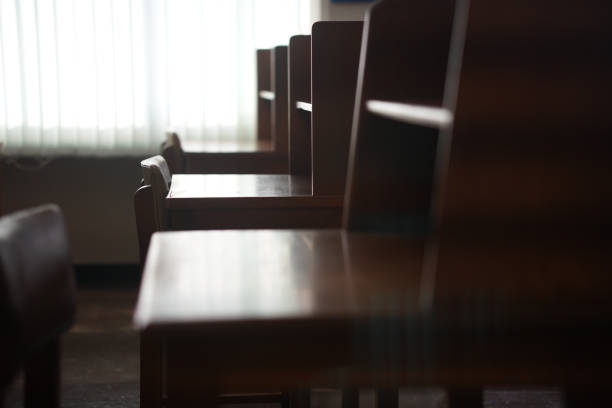 istock wooden table chair for reading in library 1360866885