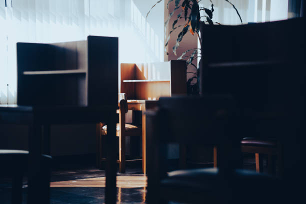 istock wooden table chair for reading in library 1360866886