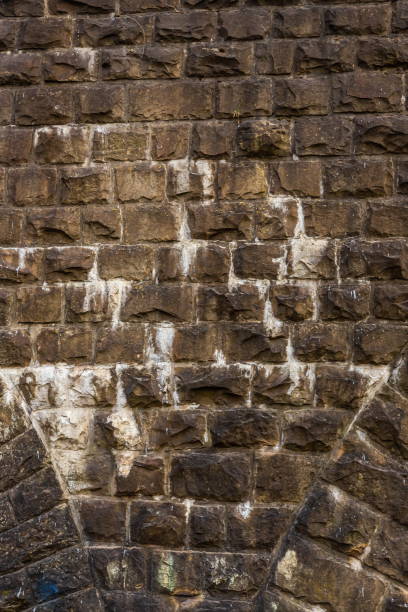 istock Very old stone masonry of the railway bridge 1360867911