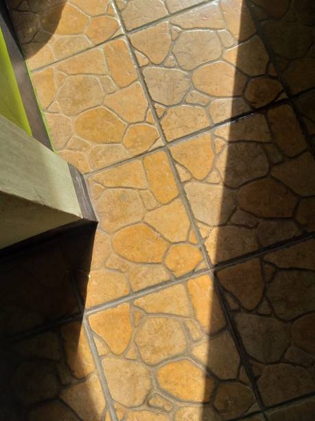 istock cement wall with shadow background in the morning 1360893295