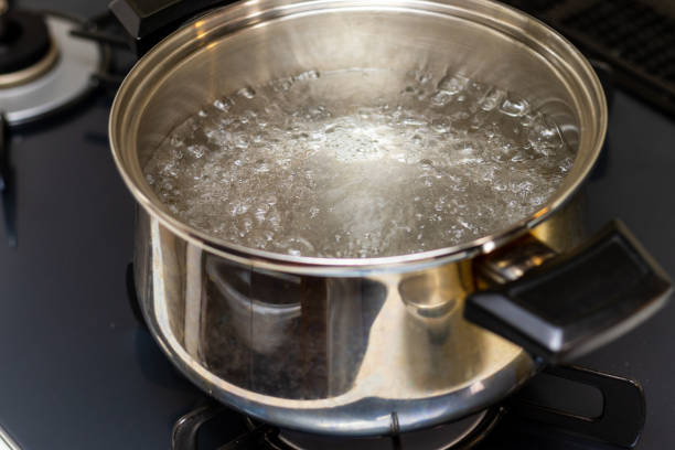 istock Metal pot with boiling water 1360896791