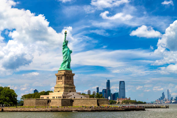 istock Statue of Liberty against Manhattan 1360903602