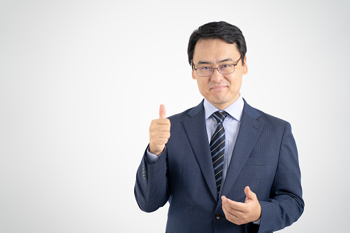 Male businessman who guides the service by hand, white background