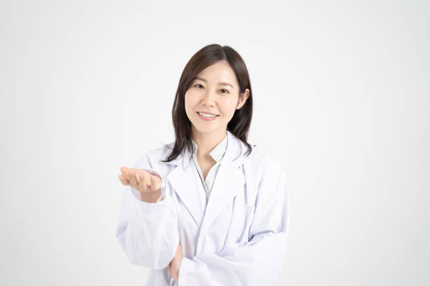 istock Image of a female doctor explaining online medical treatment through a computer screen White background 1360921961