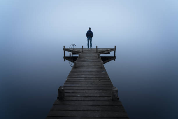 Alone in the fog stock photo