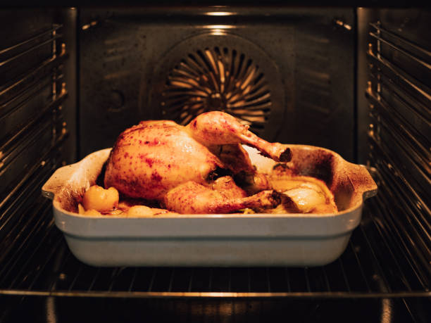 istock Grilled Chicken in the hot oven 1360924872