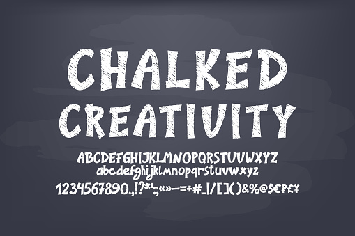 Chalked creativity font set, sketch white color style on dirty gray chalkboard.