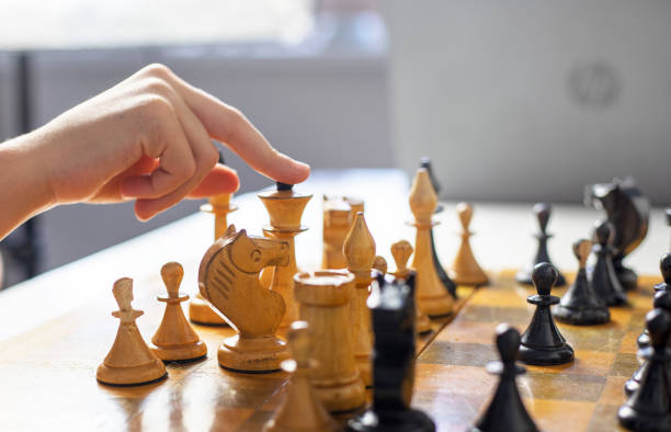 istock white queen's move to play chess, strategic planning, horizontal