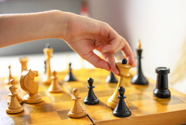 istock white queen's move to play chess, strategic planning, horizontal