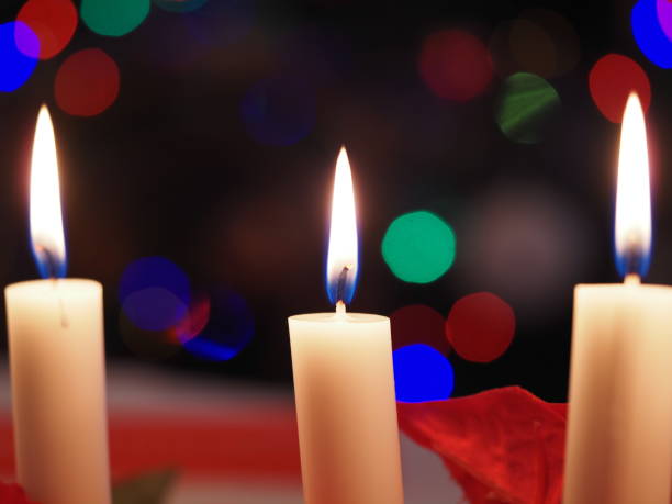 istock Christmas candles on the table 1360927968