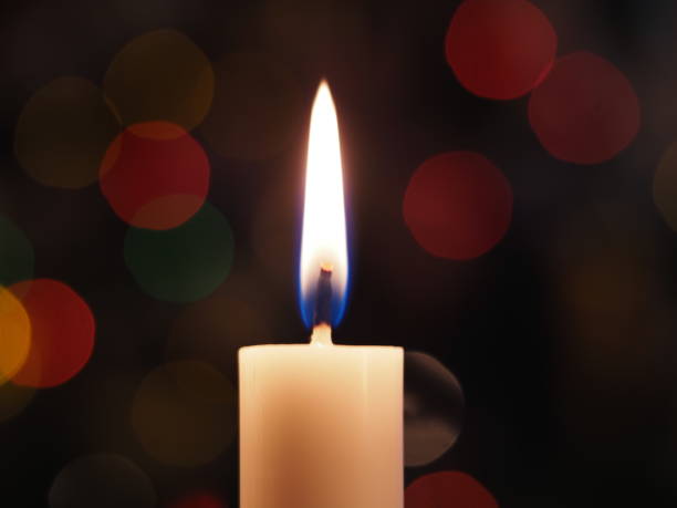 istock Christmas candles on the table 1360928612