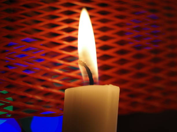 istock Christmas candles on the table inside red platic net 1360928685