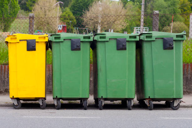 istock Green and yellow garbage bins for recycling. 1360929057