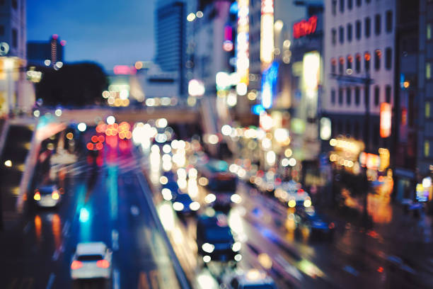 istock Car lights and city roads 1360931781