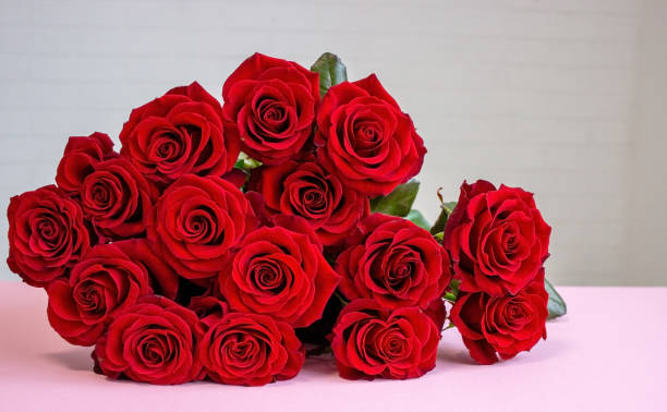 istock valentine's day concept on red background flowers heart. 1360931946
