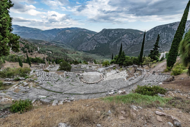 istock Ancient amphitheater on the background of mountains 1360934324