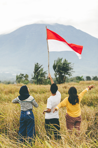 young asian adults celebrate  indonesia independence day