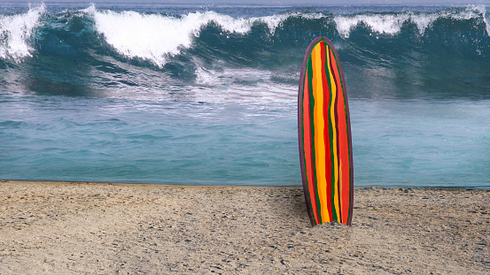 surfboard on the sand at the beach