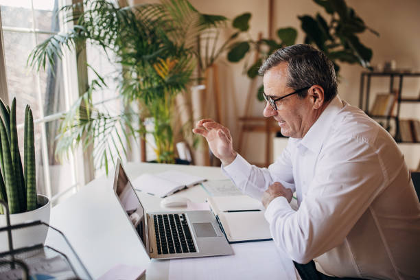 istock Business man working from home, video call 1360941298
