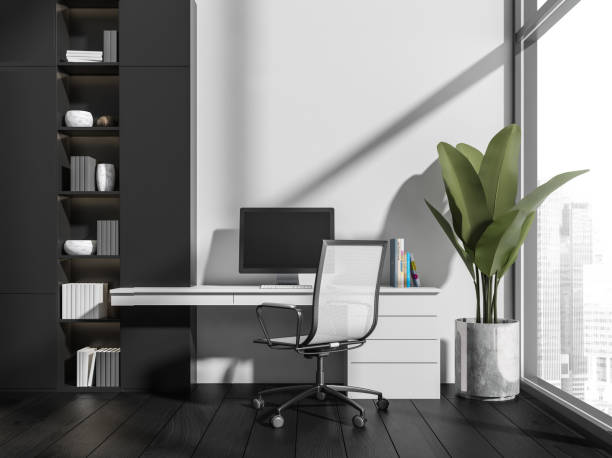 istock Business interior, armchair and table with computer, window. Mockup 1360944848